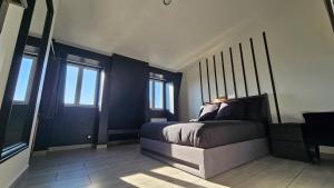 Appartements Grey And White Duplex : photos des chambres