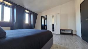 Appartements Grey And White Duplex : photos des chambres