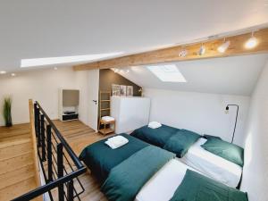 Appartements Dependance cosy en duplex avec terrasse & jardin : photos des chambres