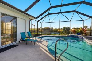 NEW LISTING! Electric-Heated Pool Home on Canal - Villa Heavenly Haven