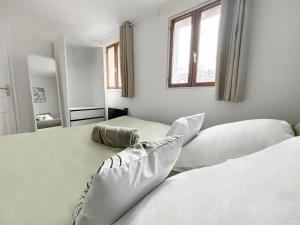 Appartements Charmant T3 lumineux & cosy : photos des chambres
