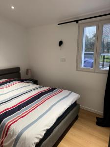 Appartements Appartement RDC vu sur jardin : photos des chambres