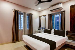 Super Collection O New Town Near OM Sweets Formerly Shiva Inn