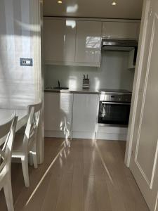 Luxury mezzanine apartment in Kensington Earls Court Garden Square