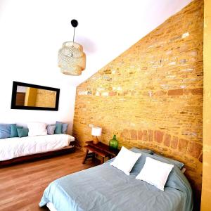Maisons de vacances Loft au coeur des vignes dans un ancien Chai : photos des chambres
