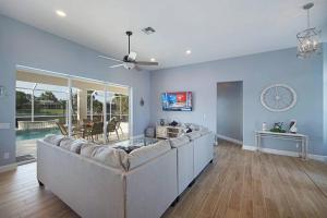 Villa Liza - Remodeled electric-heated pool home on Gulf-access canal wbikes - SWFL Rentals