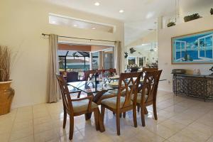 Villa Joan - Spacious electric-heated pool home on Gulf-access canal wbikes - SWFL Rentals