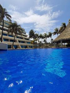 Bello Flat Duplex full equipo con acceso a la playa