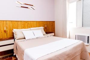 Aconchego locação lado praia Guarujá 390 metros da praia - local perto da praia e perfeito para trabalho remoto