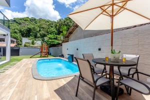 Casa em Paraty com 4 Suítes, Piscina e Churrasqueira Próximo Praias