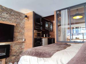 Studio chaleureux aux pieds des pistes avec terrasse - FR-1-292-225