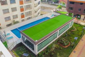 elegant classic apartment with heated swimming pool,modern equipped gym,ample parking space,and a relaxing rooftop with amazing scenic views