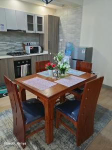 elegant classic apartment with heated swimming pool,modern equipped gym,ample parking space,and a relaxing rooftop with amazing scenic views