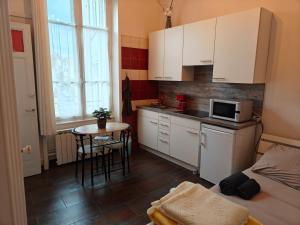 Appartements Studio Grand hotel Chatel Guyon : photos des chambres