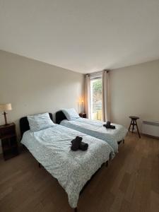 Appartements Les Rives du Golf parking prive : photos des chambres