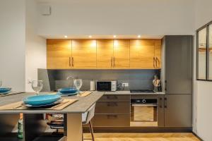 Appartements Ty Coz T3 tout confort : photos des chambres
