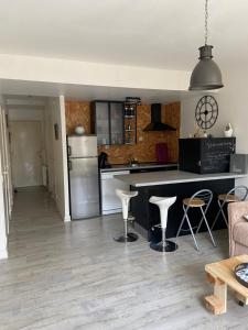 Appartement cosy avec jardin proche centre .