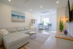 Sonnenterrasse - Helle & moderne Ferienwohnung am Meer - Simonsberg