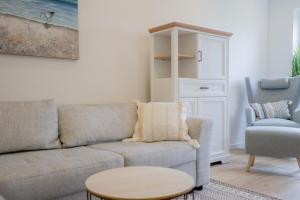 Sonnenterrasse - Helle & moderne Ferienwohnung am Meer