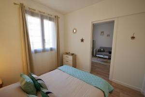 Appartements Coquet T2 pres des plages : photos des chambres