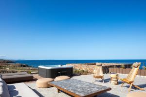 Ormus Villa - Beachfront Sanctuary Blending with Earth, Sun & Sea by etouri