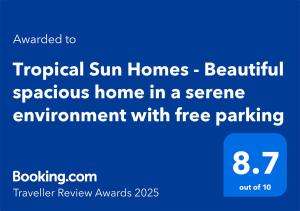Tropical Sun Homes - Beautiful spacious 3 bed home in a serene environment with free parking for 2 cars