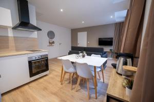 Appartements Neuf & cosy, Centre-Ville, Netflix : photos des chambres