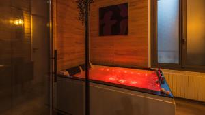 Appartements La Cle des Sens - Univers Envoutant et Sensuel : photos des chambres