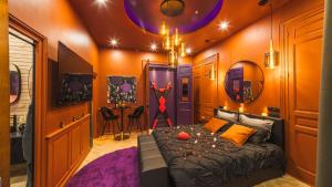 Appartements La Cle des Sens - Univers Envoutant et Sensuel : photos des chambres