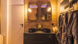 Appartements La Cle des Sens - Univers Envoutant et Sensuel : photos des chambres