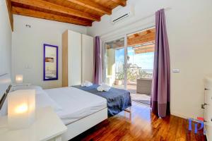 Surfing on the Lake DesenzanoLoft Official Partner Homes & Villas by Marriott Bonvoy