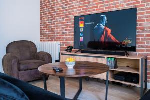 Appartements Le Petit Nid en Haut, en duplex : photos des chambres