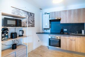 Appartements Le Petit Nid en Haut, en duplex : photos des chambres