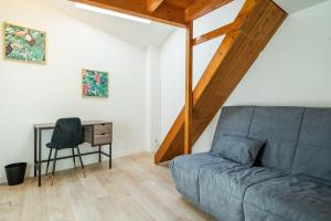 Appartements Le Petit Nid en Haut, en duplex : photos des chambres