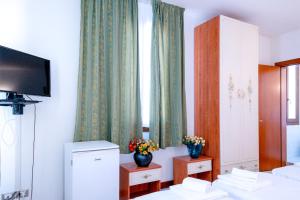 Chambre Quadruple avec Salle de Bains Privative