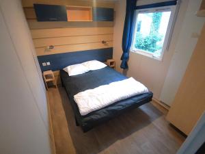 Campings Bungalow tout confort 2ch 5pers 400DJ : photos des chambres