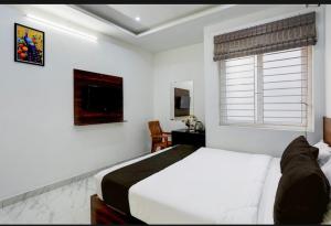 Hotel Rhythms Ramapuram