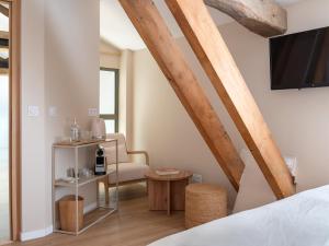 Maisons d'hotes Le Pavillon des Capitans : photos des chambres