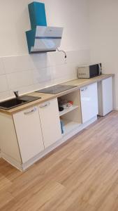 Appartements Charme rez de rue : photos des chambres