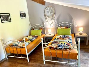 Appartements Les Petites Ecuries - Gite Bijou : photos des chambres