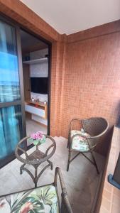 Apartamento com 2 suítes, varanda, vista mar, infraestrutura
