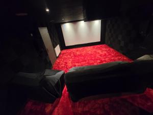 Appartements Cocon Spa & Cinema Room : photos des chambres