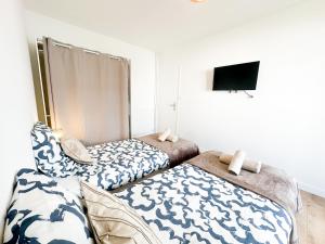 Appartements La parenthese partagee : photos des chambres