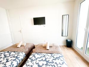 Appartements La parenthese partagee : photos des chambres