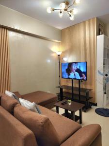 Zinnia Tower 2br condo with QC Cityview