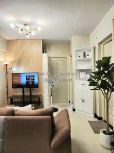 Zinnia Tower 2br condo with QC Cityview