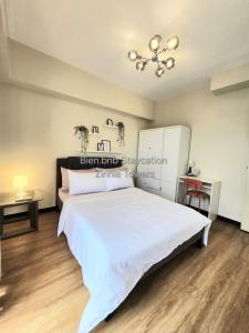 Zinnia Tower 2br condo with QC Cityview