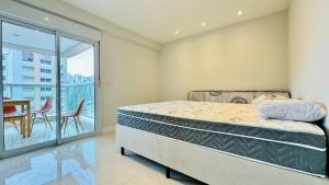Apartamento Novo Frente ao Mar na Praia das Astúrias - 08 Pessoas