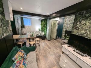 Appartements Appartement verdoyant au bord du lac Leman entre Evian et Thonon dans une Villa : Studio avec Terrasse