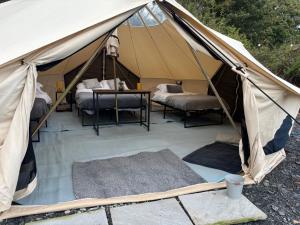Cozy Hot Tent with Log Burner & Hot Tub Left Tent